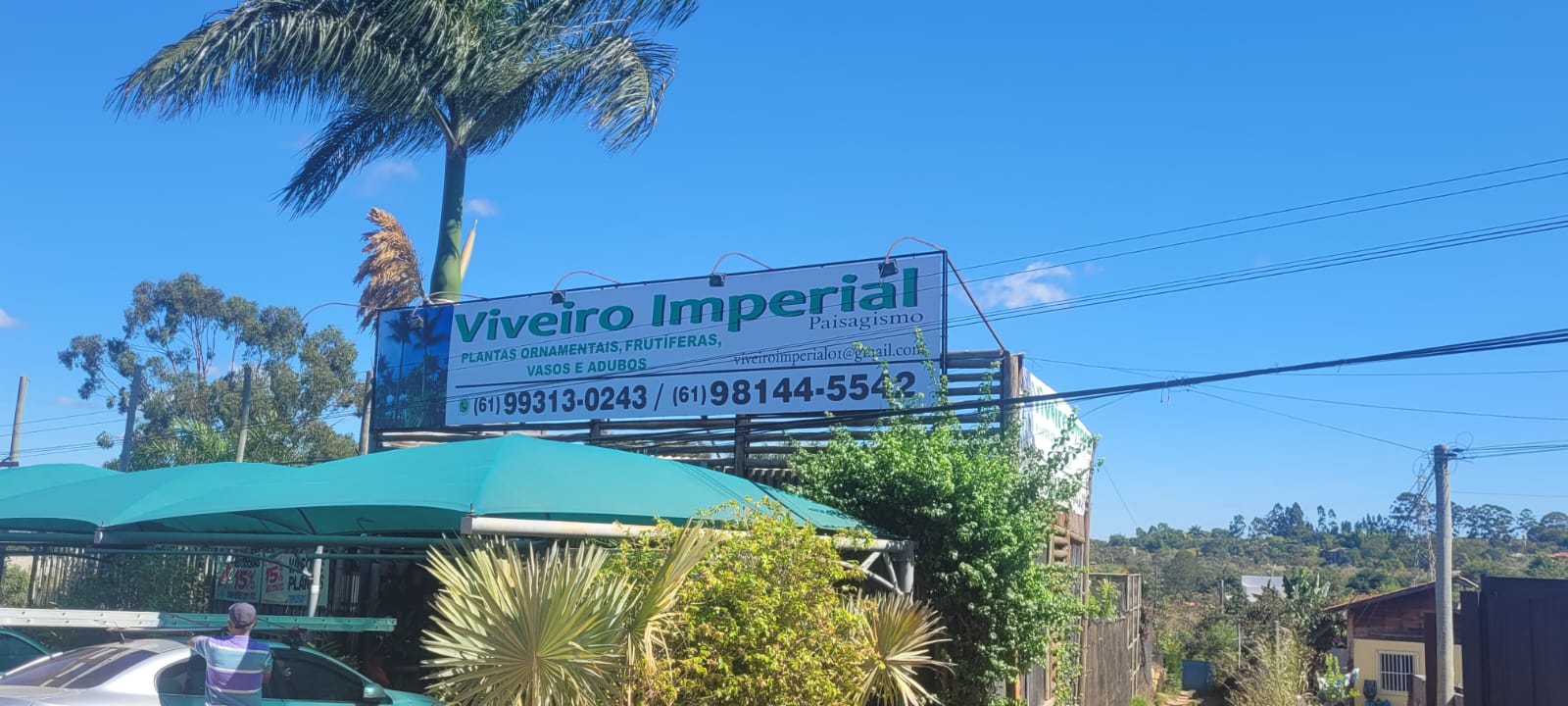 Fachada em lona impressa — Viveiro Imperial Paisagismo